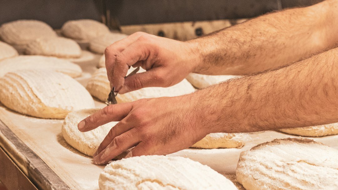 baker making bread