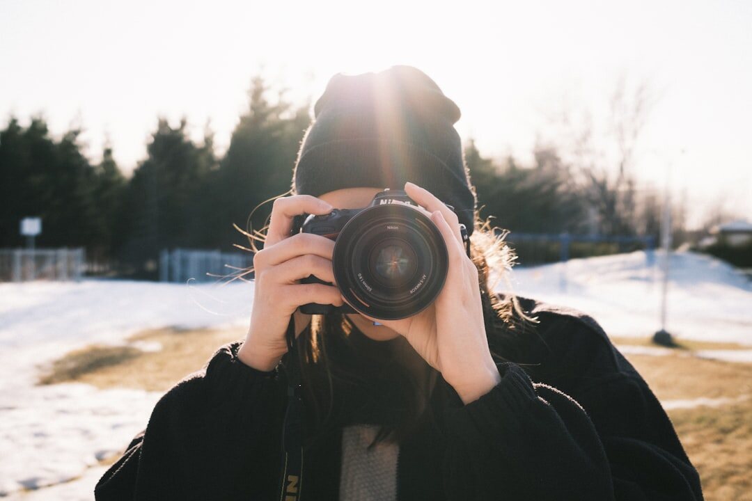 person photographing ordinary scene